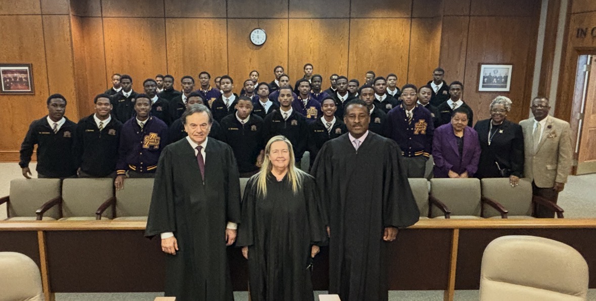 Students from St. Augustine High School dining and discussing the law with 5th Circuit Court Judges.